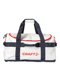 Craft NOR ADV Entity Duffel 70 L – Blaze / Hvit, forside